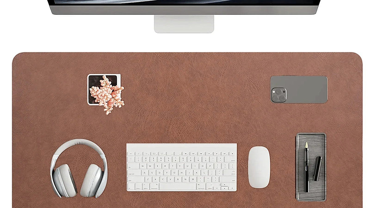 Desk mat materials compared: full-grain leather, vegan leather and cork